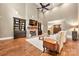 Bright and airy living room showcasing hardwood floors, a fireplace, and ample natural light at 1068 Grant Dr, Denver, NC 28037
