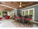 Covered outdoor bar features seating and a view of the stone fireplace on the patio at 1068 Grant Dr, Denver, NC 28037