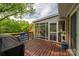 Inviting screened porch with deck access, perfect for outdoor living at 111 Peoria Ln, Kings Mountain, NC 28086