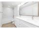 Bright bathroom featuring a double vanity with white cabinetry and a shower-tub combination with marble tile surround at 1141 Thayer Glen Ct, Charlotte, NC 28213