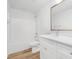 Clean, well-lit bathroom with tub-shower combo, modern fixtures, and white vanity at 1144 Thayer Glen Ct, Charlotte, NC 28213