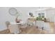Open-concept dining and living area with modern furniture, abundant light, and stylish decor at 1144 Thayer Glen Ct, Charlotte, NC 28213