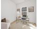Bright office space featuring a glass desk, modern decor, and plenty of natural light at 1144 Thayer Glen Ct, Charlotte, NC 28213