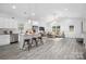 Bright living room featuring open concept floor plan with modern decor and stylish furniture at 1149 Thayer Glen Ct, Charlotte, NC 28213