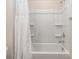 Bathroom featuring a white bathtub and shower combination with a white shower curtain at 12214 Ardrey Park Dr, Charlotte, NC 28277