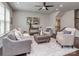 Inviting living room showcasing modern decor, hardwood floors, and neutral paint at 12214 Ardrey Park Dr, Charlotte, NC 28277