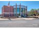 Attractive modern YMCA facility with American flag flying out front and ample parking at 12214 Ardrey Park Dr, Charlotte, NC 28277
