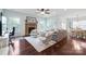 Spacious living room with a brick fireplace, hardwood floors, and a comfortable seating area at 13115 Union Square Dr, Huntersville, NC 28078