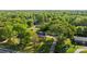 Serene aerial view of the property surrounded by lush green trees and a long driveway at 1321 South Point Rd, Belmont, NC 28012
