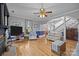 Spacious living room with hardwood floors, fireplace, and seamless flow to other areas at 1321 South Point Rd, Belmont, NC 28012