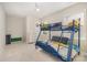 Bedroom featuring bunk beds, lots of natural light, and ample storage at 1390 Cedardale Ln, Denver, NC 28037