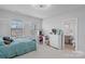 Bedroom featuring a bed, desk and an ensuite bathroom at 1390 Cedardale Ln, Denver, NC 28037
