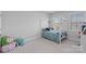 Cozy bedroom with a comfortable bed and a peaceful, minimalist design at 1390 Cedardale Ln, Denver, NC 28037