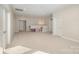 Bright and airy bonus room offering neutral paint, plush carpet, and versatile layout at 1390 Cedardale Ln, Denver, NC 28037