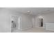 Large bonus room with doorways leading to secondary rooms provides flexible living space at 1390 Cedardale Ln, Denver, NC 28037
