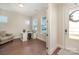 Cozy home office featuring hardwood floors, a comfortable chair, and ample natural light at 1390 Cedardale Ln, Denver, NC 28037