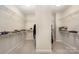 Spacious walk-in closet with ample storage space and custom shelving for organization at 1390 Cedardale Ln, Denver, NC 28037