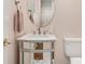 Chic bathroom with a mirrored vanity, stylish fixtures, and a clean, modern design at 14457 Adair Manor Ct, Charlotte, NC 28277