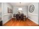 Elegant dining room featuring a stylish chandelier and hardwood floors at 14457 Adair Manor Ct, Charlotte, NC 28277