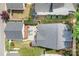 An aerial view of a landscaped backyard featuring a spacious patio at 14541 Holly Springs Dr, Huntersville, NC 28078