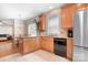 Well-equipped kitchen with granite countertops, stainless steel appliances, and an open layout at 14541 Holly Springs Dr, Huntersville, NC 28078