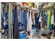 This walk-in closet has ample clothing and shoe storage at 14541 Holly Springs Dr, Huntersville, NC 28078
