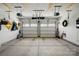 Clean, empty two-car garage with white doors and ample space at 1578 Whitman Ct, York, SC 29745