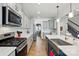 Spacious kitchen with stainless steel appliances, lots of counter space, and plenty of storage at 1578 Whitman Ct, York, SC 29745