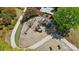 Aerial shot of a well-maintained playground with various play structures and safe surfacing materials at 1578 Whitman Ct, York, SC 29745