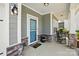 Inviting covered front porch with rocking chairs and decorative accents for a relaxing outdoor space at 1578 Whitman Ct, York, SC 29745