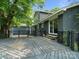 Exterior view of a home with a large weathered deck surrounded by mature trees at 1620 Matthews Dr, Rock Hill, SC 29732