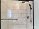 Modern bathroom shower featuring sleek tile, glass door, and contemporary fixtures at 1620 Matthews Dr, Rock Hill, SC 29732