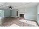 Spacious living room with coffered ceiling, fireplace, and large windows at 1620 Matthews Dr, Rock Hill, SC 29732