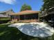 Backyard shows a patio and screened-in porch at 17408 Summer Place Dr, Cornelius, NC 28031