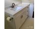 This bathroom has a white vanity with silver pulls and a bright white countertop at 17408 Summer Place Dr, Cornelius, NC 28031