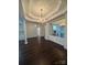 Stylish dining room featuring an elegant chandelier and hardwood flooring at 17408 Summer Place Dr, Cornelius, NC 28031