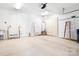 Spacious garage with epoxy flooring, ample storage, and overhead lighting at 17408 Summer Place Dr, Cornelius, NC 28031