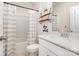 Clean bathroom with a shower-tub combination, a sink with a white vanity, and a modern design at 17502 Snug Harbor Rd, Charlotte, NC 28278