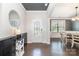 Inviting foyer with dark hardwood floors and views into the dining area at 17502 Snug Harbor Rd, Charlotte, NC 28278