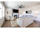 Spacious living room with a fireplace, built-in shelving, and comfortable seating at 17502 Snug Harbor Rd, Charlotte, NC 28278