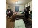 Bedroom with a four post bed frame, large dresser, and neutral tones, needs a bit of tidying at 1849 Brownstone St, Charlotte, NC 28216