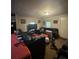 A spacious living room featuring a comfortable black leather couch, perfect for relaxing and entertaining at 1849 Brownstone St, Charlotte, NC 28216