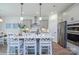 Bright kitchen features modern cabinets, pendant lighting, an island with seating, and stainless steel appliances at 2007 Mantle Ridge Dr # 192, Indian Trail, NC 28079