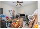 Bedroom with cluttered furniture, boxes, and wood-look floors at 209 Sheffield Dr, York, SC 29745
