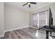 Bedroom featuring ceiling fan, light curtains, and wood-look floors at 209 Sheffield Dr, York, SC 29745