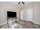 Bedroom featuring ceiling fan, wood-look floors, and doorway at 209 Sheffield Dr, York, SC 29745