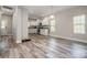 Open-concept area featuring a modern kitchen, seamlessly integrated with the living space at 209 Sheffield Dr, York, SC 29745