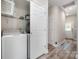 Laundry area with modern washer and dryer, plus shelving for storage at 209 Sheffield Dr, York, SC 29745