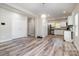 Spacious area showcasing the flow between the living room and a well-appointed kitchen at 209 Sheffield Dr, York, SC 29745