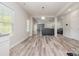 Bright and spacious living area with ample natural light and open layout to kitchen at 209 Sheffield Dr, York, SC 29745